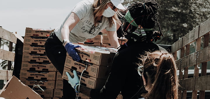 volunteers unloading donations