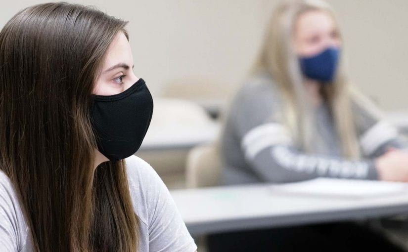 Students wearing masks indoors