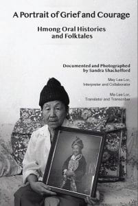 A book cover depicting a Hmong woman holding a picture
